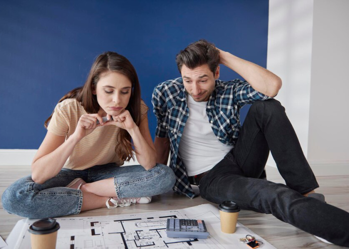 couple tired planning their new house 1112411 2111 couple tired planning their new house 1112411 2111
